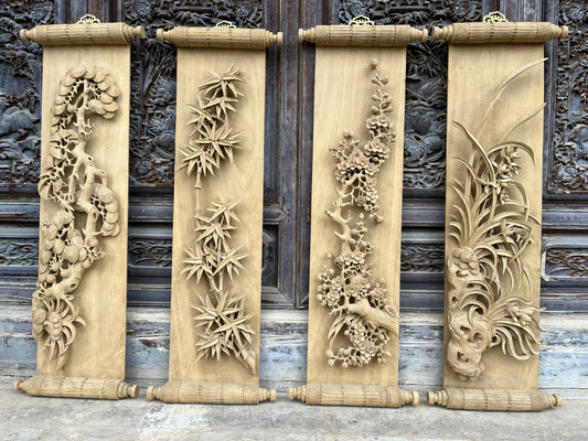 Hand carved pine trees, bamboo, plum blossoms, and orchids