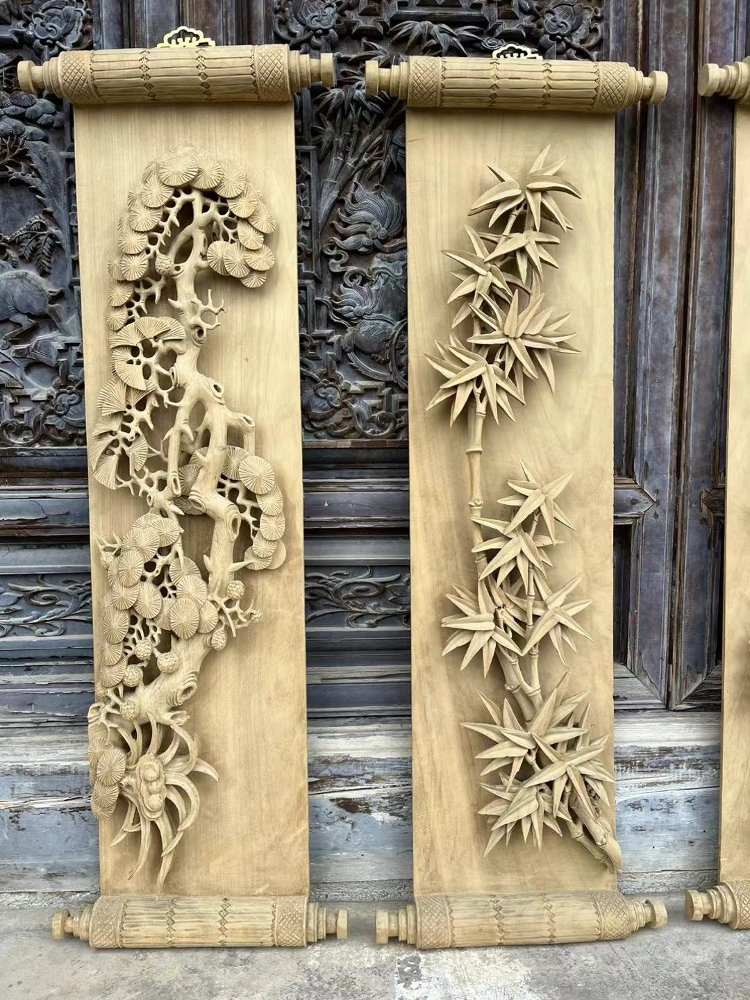 Hand carved pine trees, bamboo, plum blossoms, and orchids